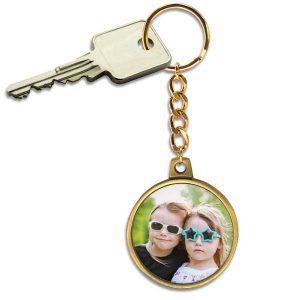 Keep your keys together and safe with an antique gold chain key ring with a picture on it