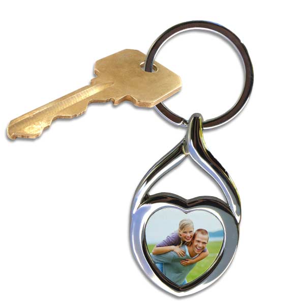 Keep a picture of someone you love close with a personalized heart photo key ring