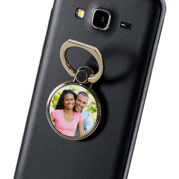 Add your own picture to a phone ring stand and personalize your phone