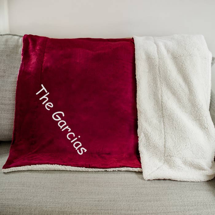 Create an embroidered delight for your home or give as a gift with a custom sherpa blanket