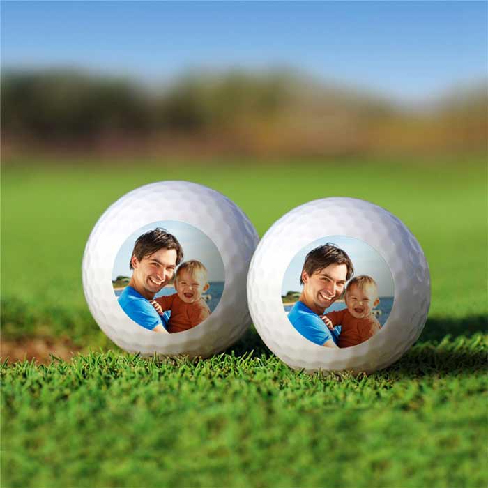 Personalized golf balls with a photo of a dad and his child